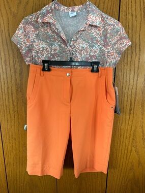 NWT Annika by Cutter & Buck women's tangerine golf shorts,  Bermuda style.